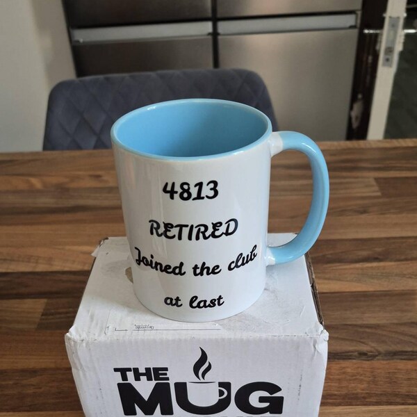 Customer photo of their personalised retirement mug from TheMugVault